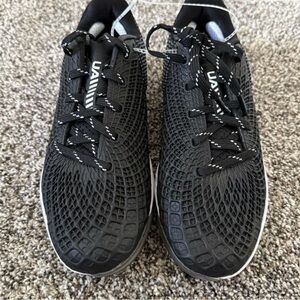 Under Armour Women’s Black Textured softball cleats Sz 7 1/2